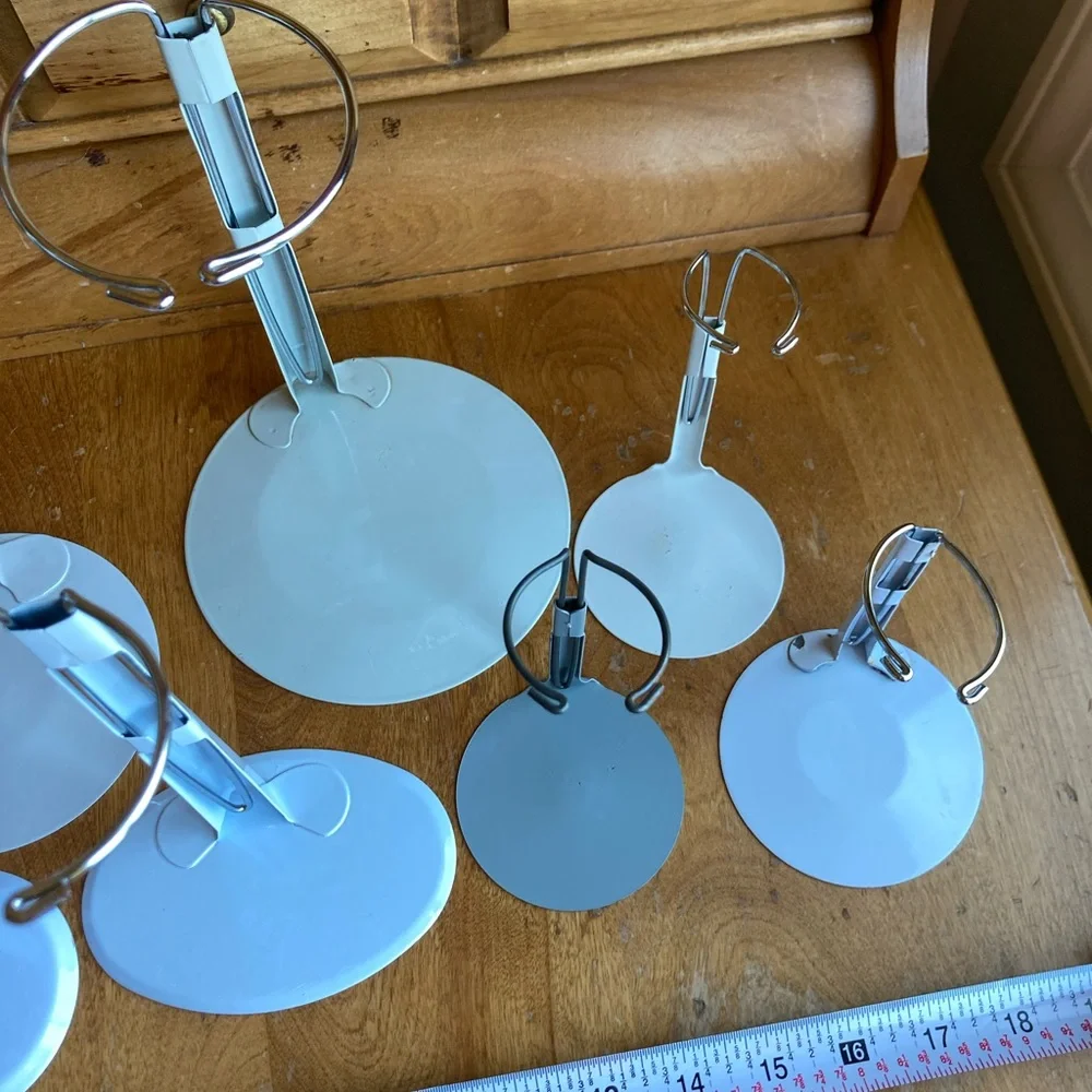 7 doll holders or White and Gray Jewelry Stands